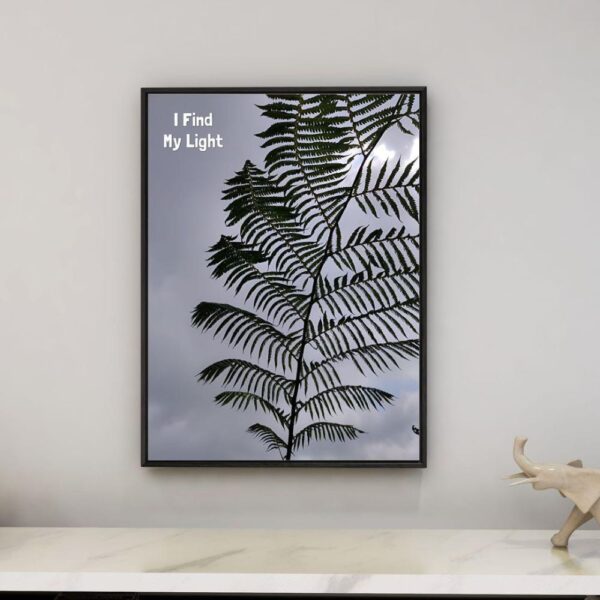 "A motivational image titled 'I Find My Light,' depicting sunlight filtering through dense forest foliage onto a beautiful tree stem, symbolizing human resilience, emotional growth, and the pursuit of positivity amidst challenges."